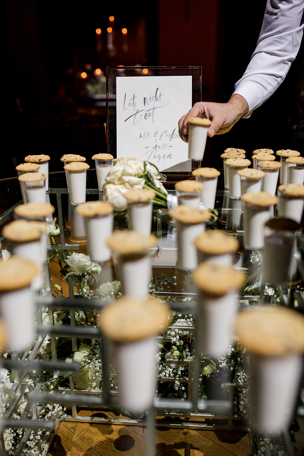 Milk and Cookie reception snacks with signage. 