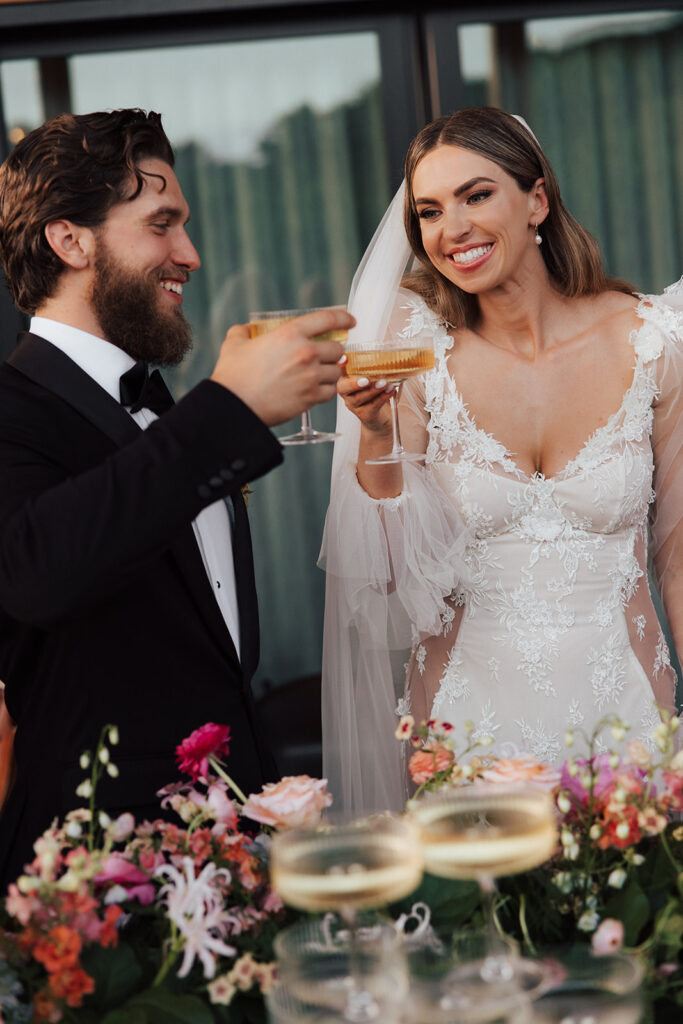 Bride and Groom share a toast together.