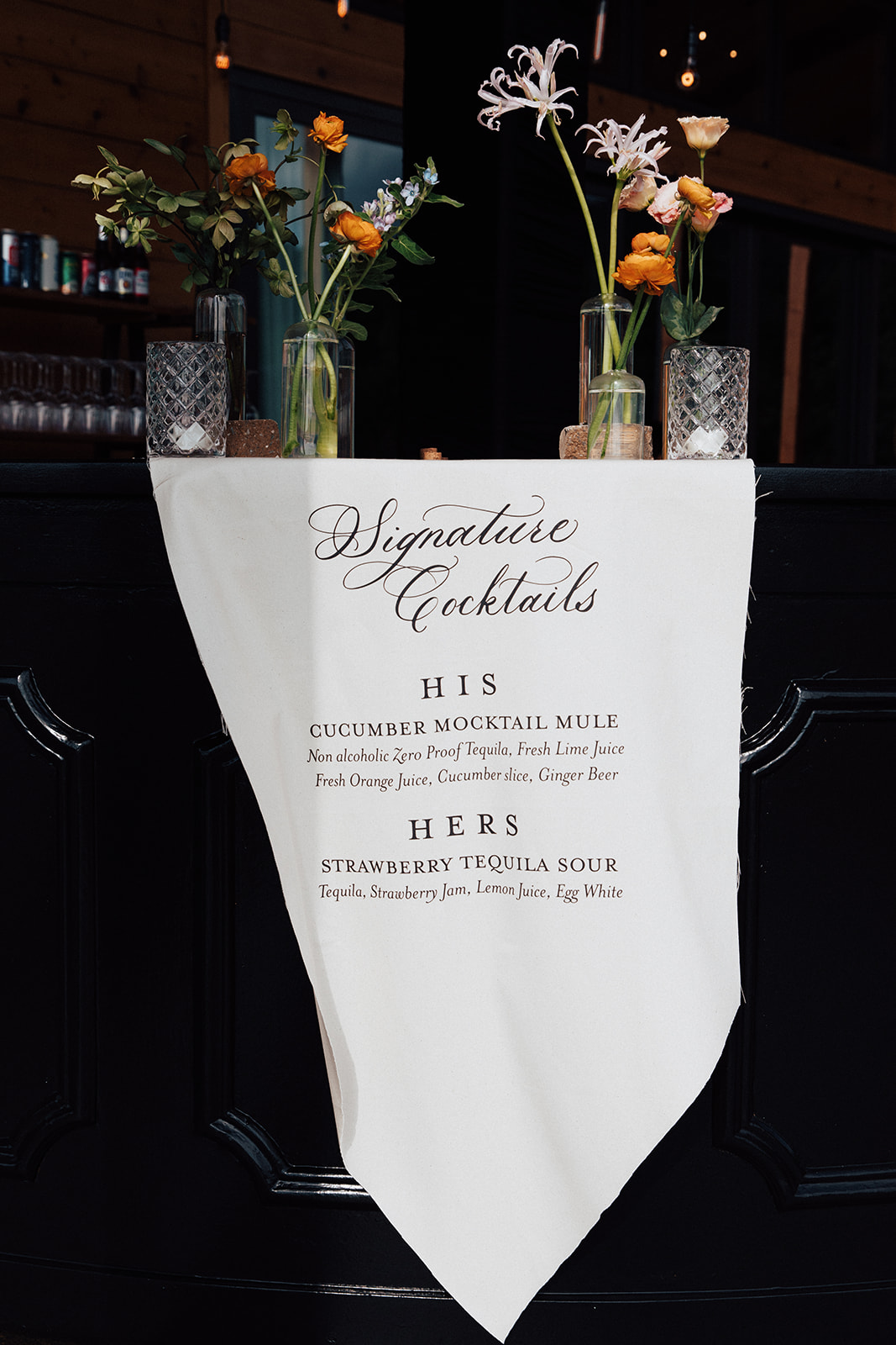 Textured wedding details | Fabric banner bar signage displaying signature cocktail menu.