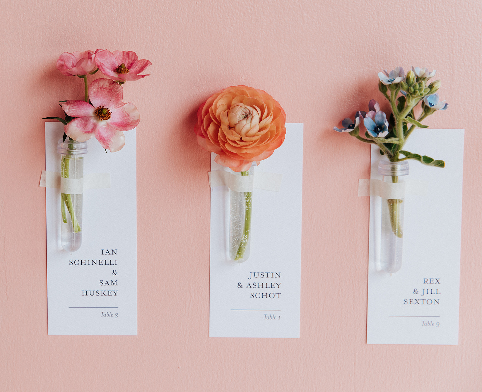 Seating chart display to include individual escort cards and flowers.