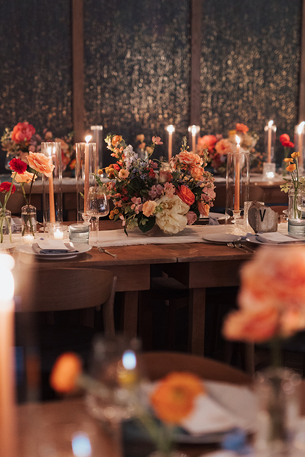 Formal reception tablescape to include candles, place settings, florals, and custom menus.