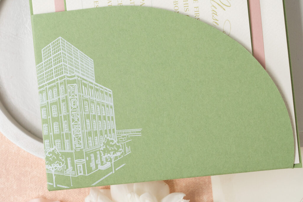 custom invitation suite with die-cut pocket. Custom architectural sketch on pocket.