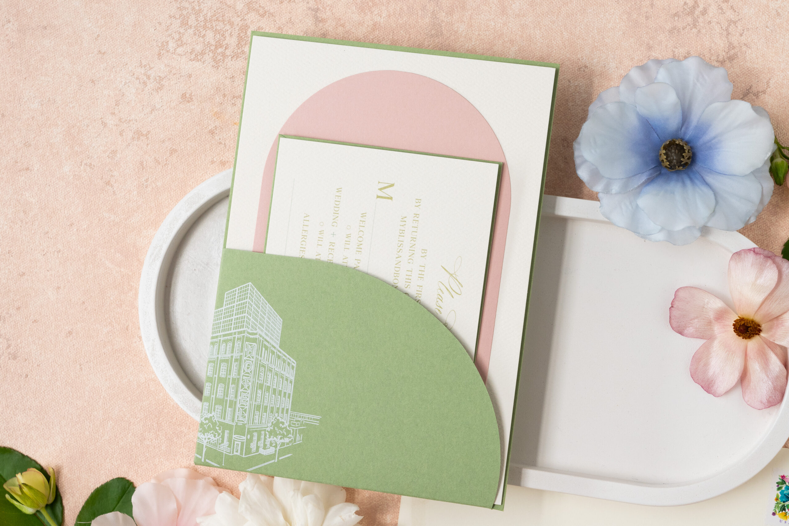 custom invitation suite with die-cut pocket. Custom architectural sketch on pocket.