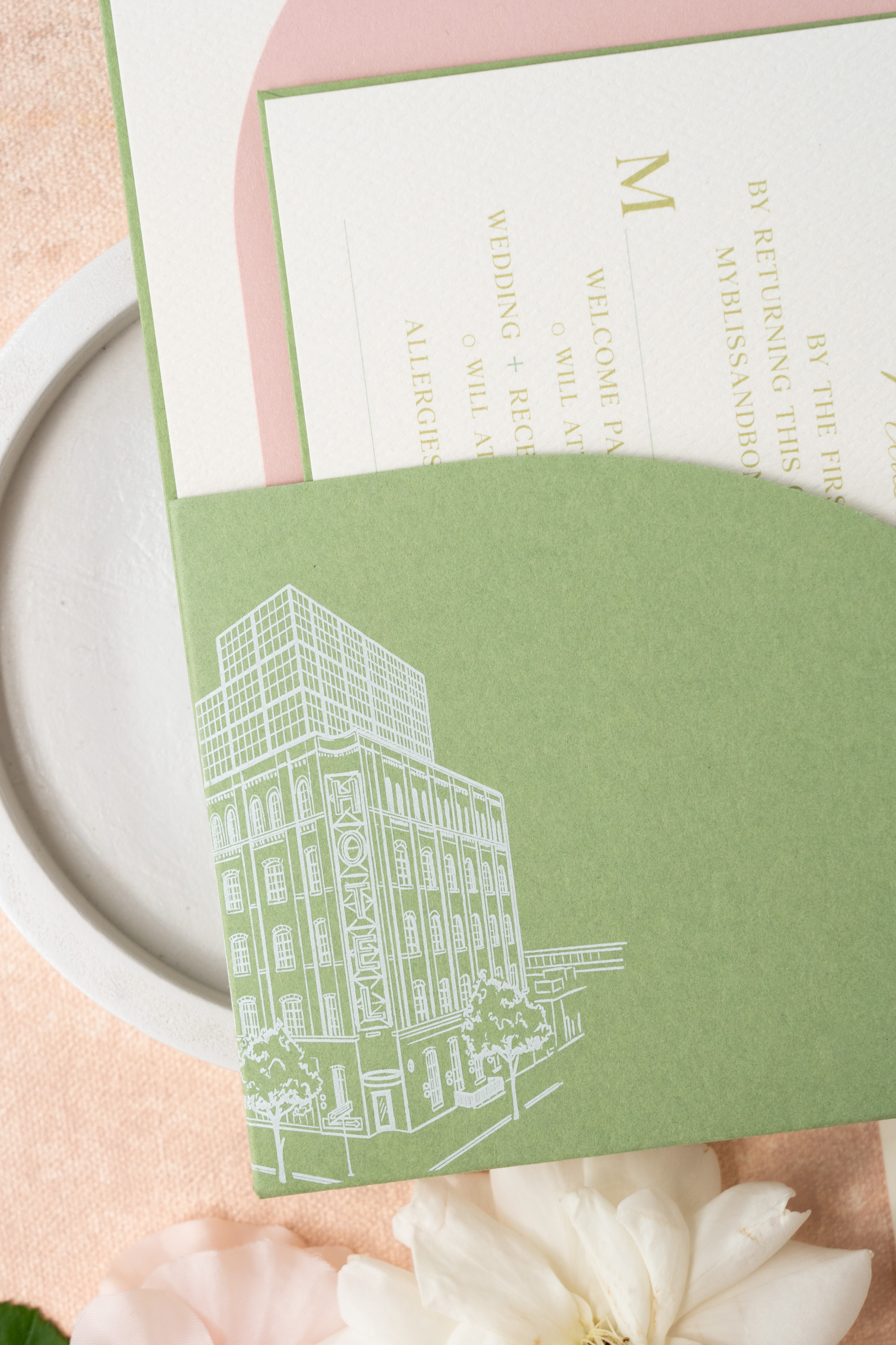 custom invitation suite with die-cut pocket. Custom architectural sketch on pocket.