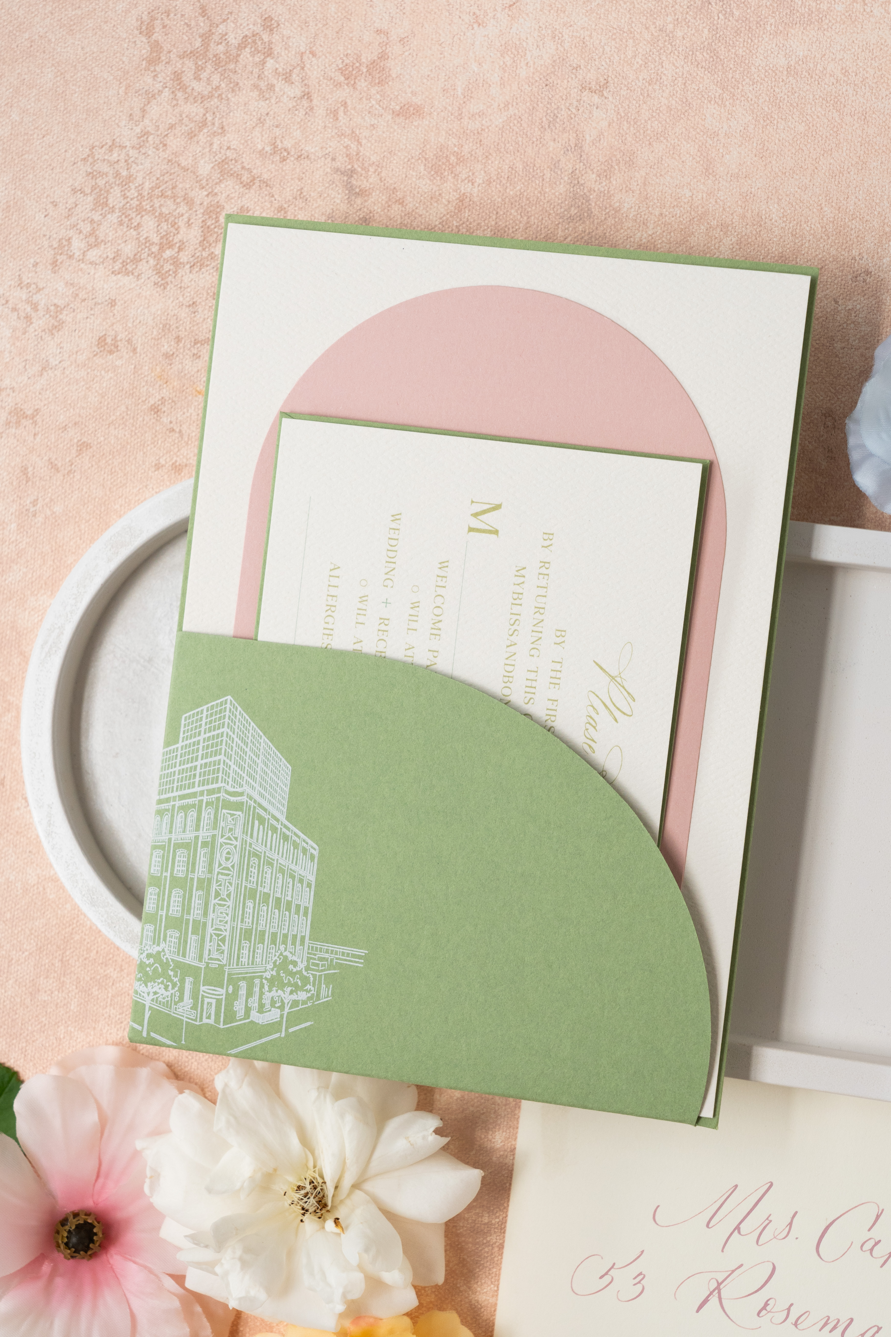 custom invitation suite with die-cut pocket. Custom architectural sketch on pocket.