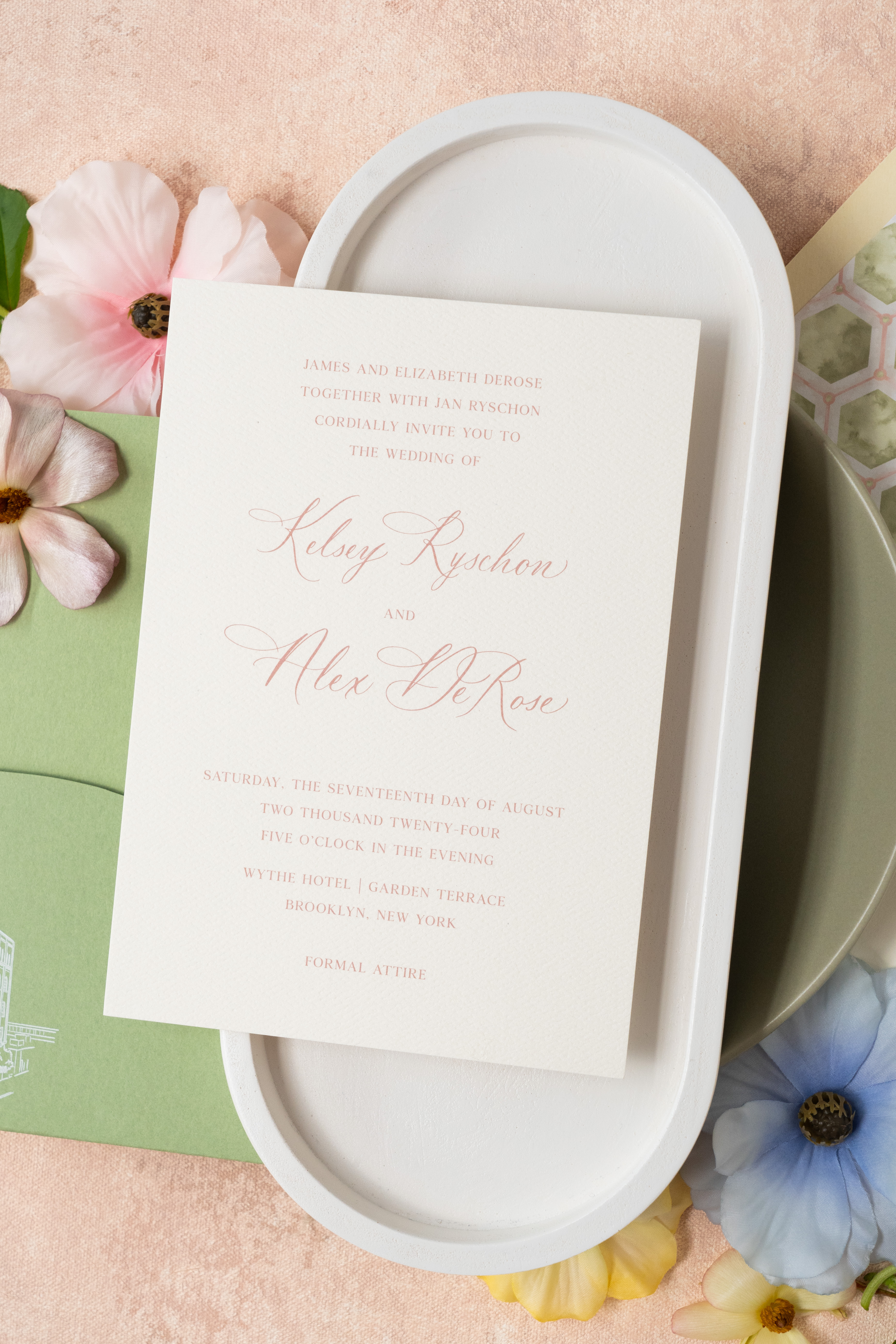 Custom wedding invitation suite showcasing custom die-cut pocket, custom architectural sketch, summer pinks, greens, envelope calligraphy, and custom envelope liner.