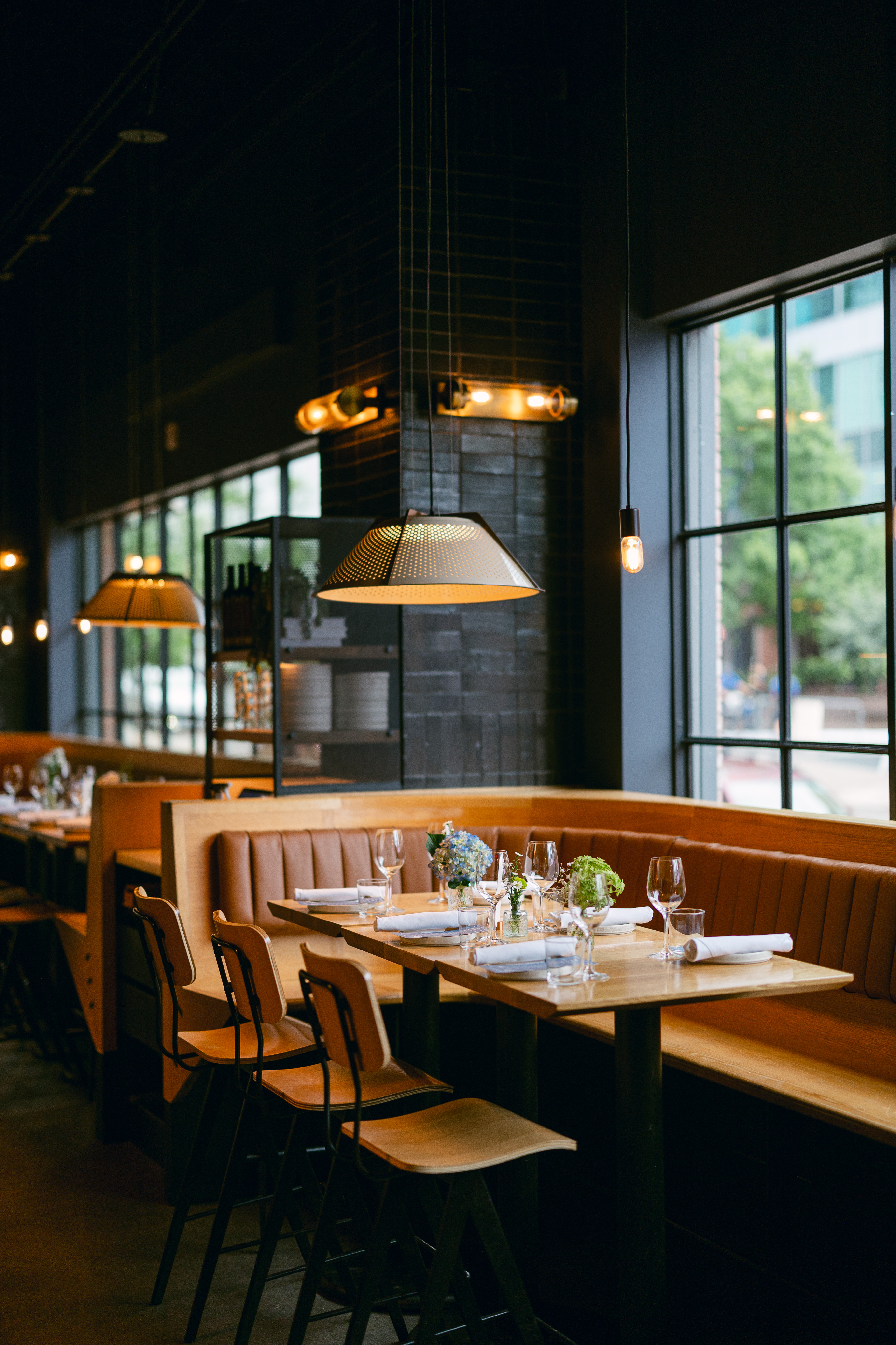 restaurant table set for rehearsal dinner.