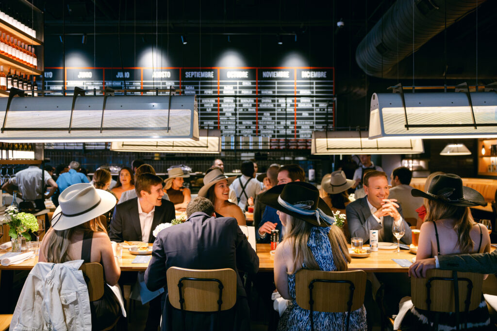 Guests enjoying rehearsal dinner.