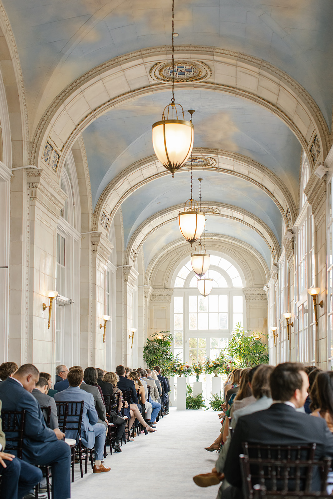 Guests are seated for wedding ceremony inside The Hermitage Hotel.