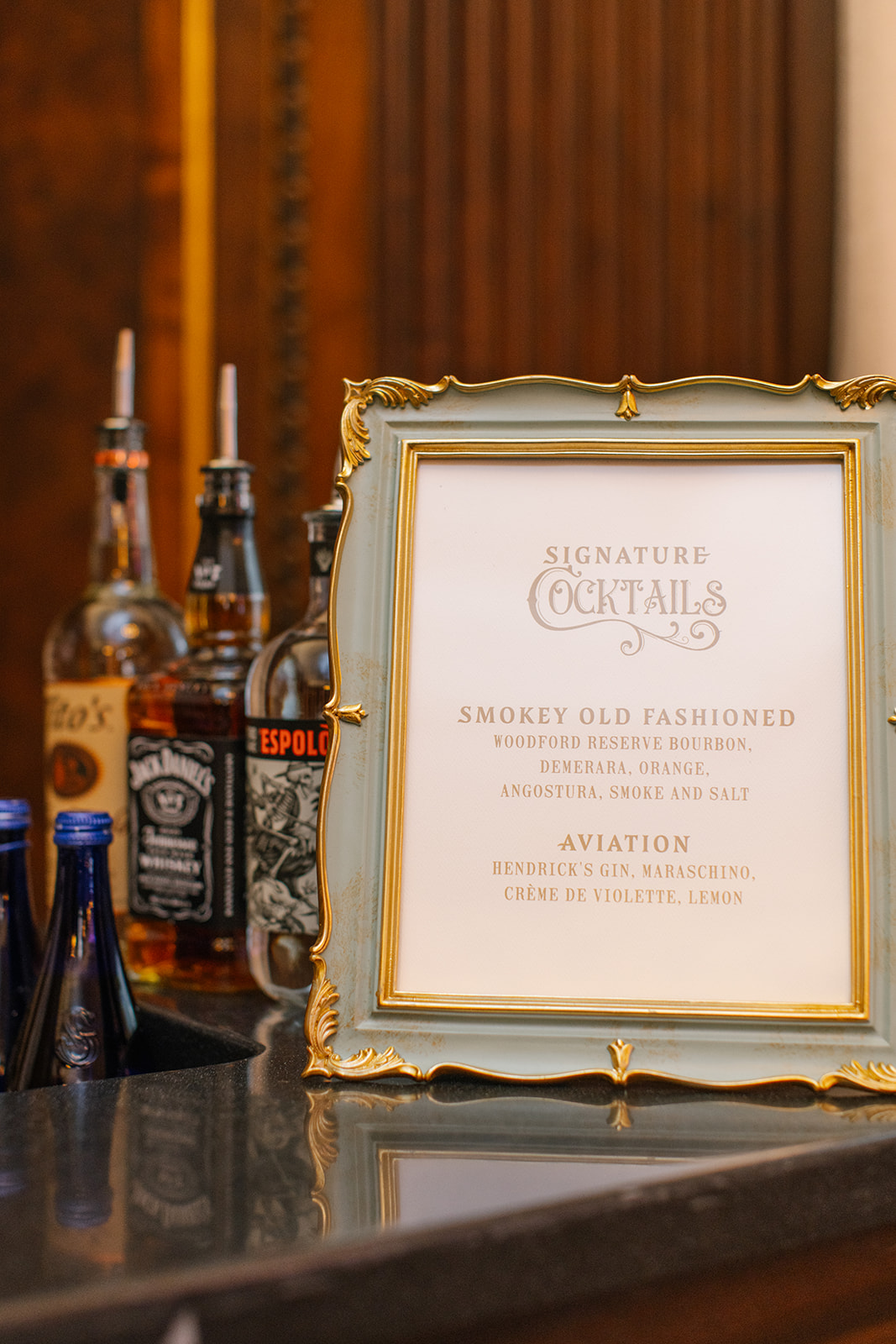 Bar signage in blue vintage frame.