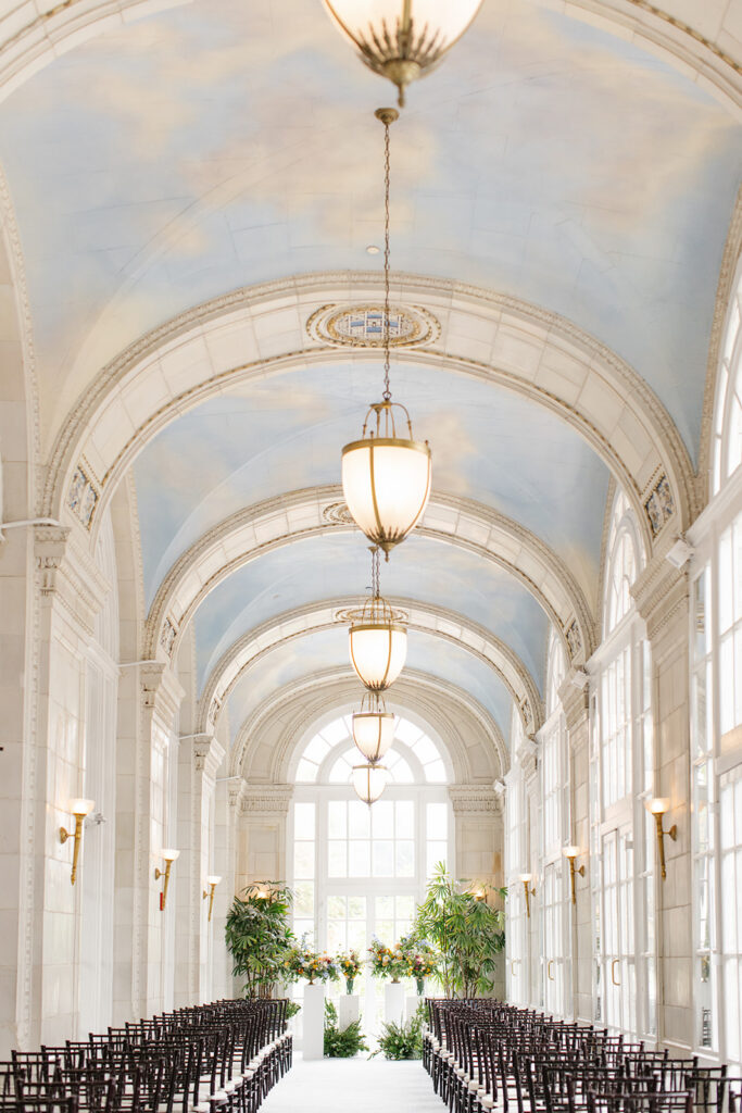 Wedding ceremony venue prepared for guest entrance.