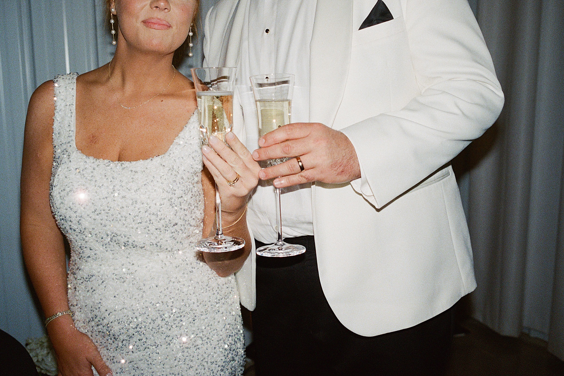 newlyweds toast with champagne