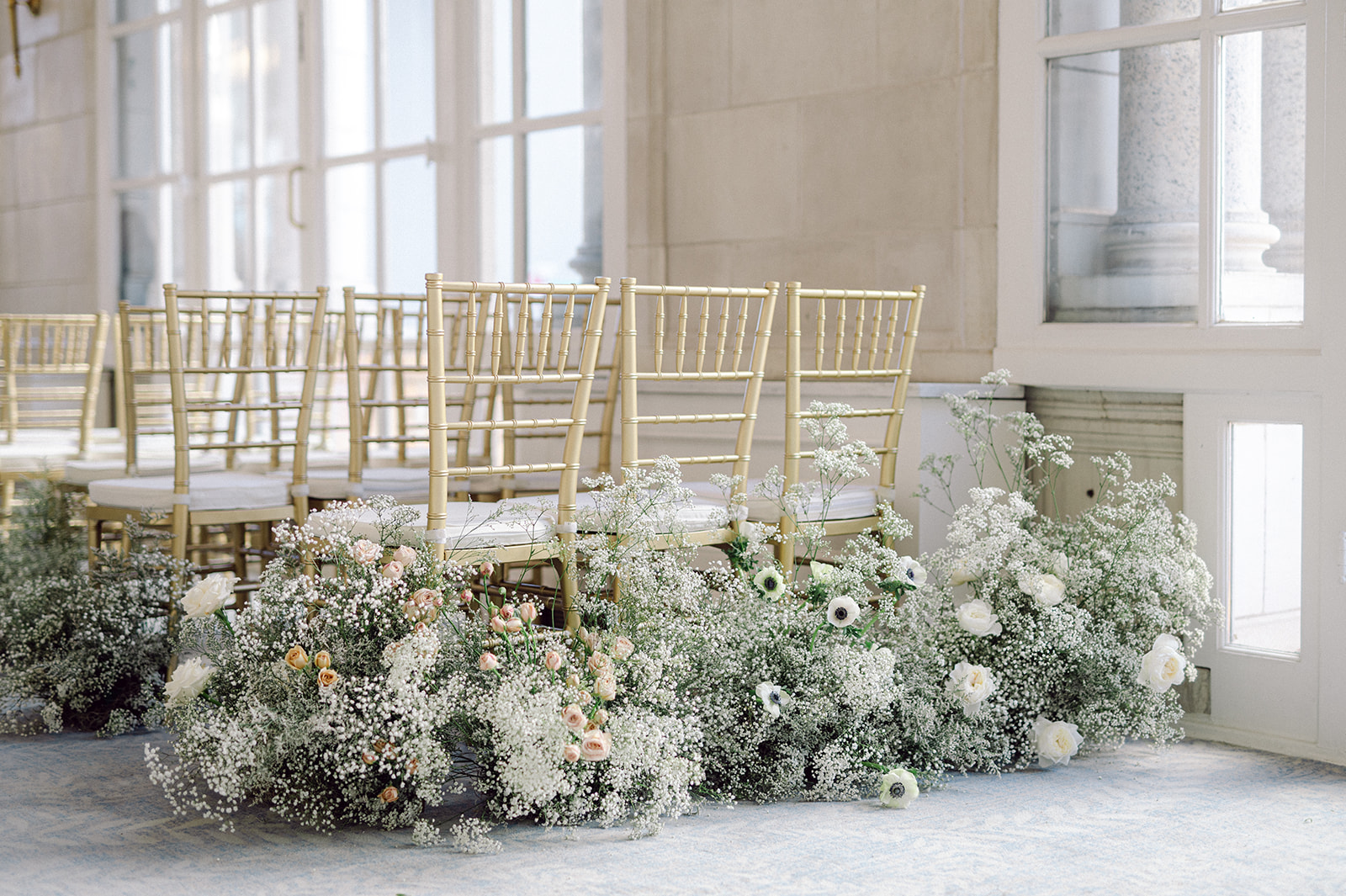 white florals at wedding ceremony at Hermitage Hotel