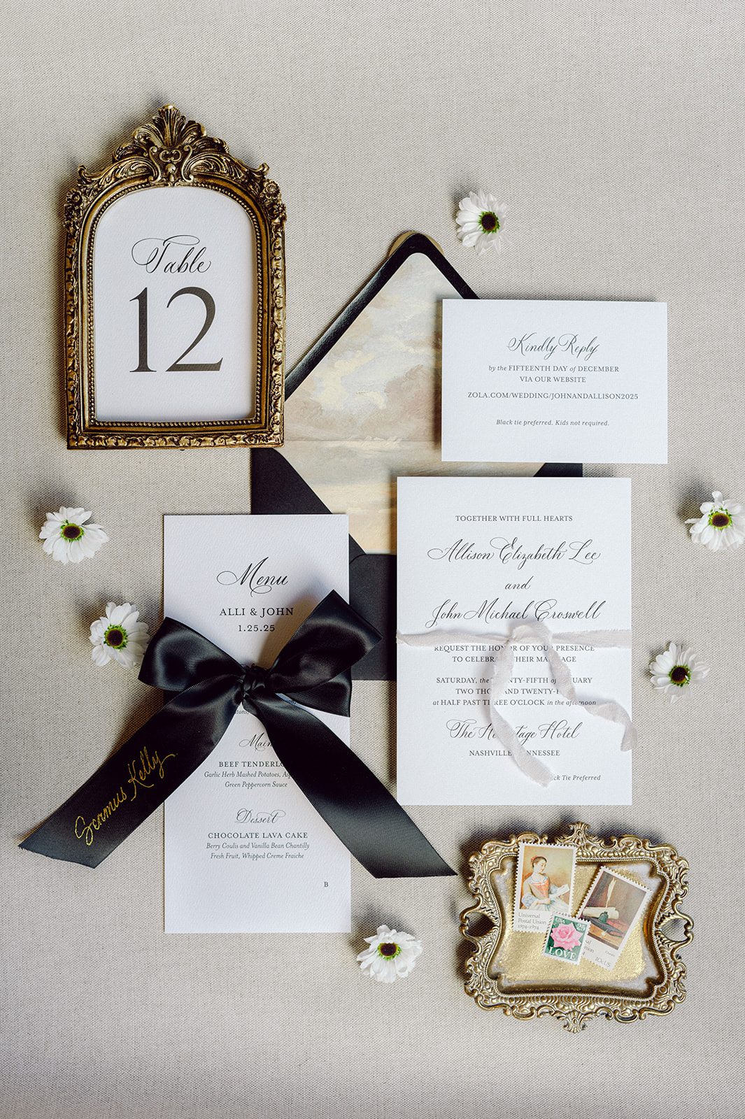 black ribbon place cards tied around custom menus featuring hand lettered hot foiled calligraphy  | Elegant wedding invitation suite 